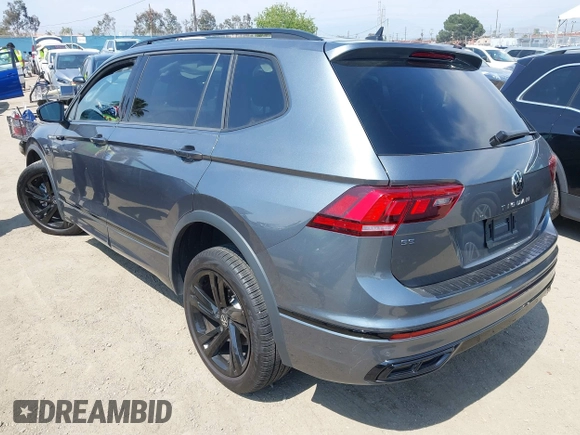 2023 Volkswagen Tiguan SE R-Line Black with VIN 3VVCB7AX8PM036684, listed as a IAAI auction lot 42169004 with 25,024 mi miles and . Bid and sale history available at DreamBid. Image 3.