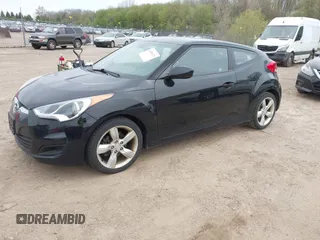 2013 Hyundai Veloster w/Gray Int with VIN KMHTC6AD6DU179826, listed as a IAAI auction lot 42151479 with 82,643 mi miles. Bid and sale history available at carsss.com. Image 2.