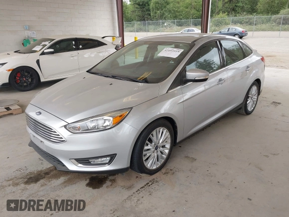 2017 Ford Focus Titanium с VIN 1FADP3J29HL329410, выставлен на аукционе IAAI как лот 42493519 с пробегом 22 639 миль миль и . История ставок и продаж доступна на DreamBid. Изображение 2.