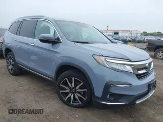 2022 Honda Pilot Touring 7-Passenger with VIN 5FNYF6H68NB056077, listed as a IAAI auction lot 42357338 with 18,193 mi miles and . Bid and sale history available at DreamBid. Image 1.