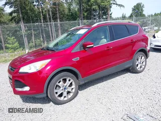2015 Ford Escape Titanium with VIN 1FMCU9J93FUB28037, listed as a IAAI auction lot 42432345 with 133,242 mi miles and . Bid and sale history available at DreamBid. Image 17.