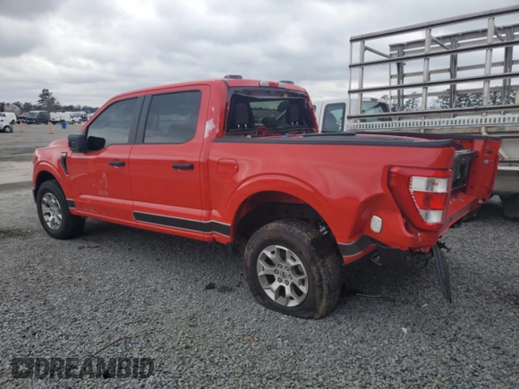 2023 Ford F-150 with VIN 1FTFW1P85PKD82406, listed as a Copart auction lot 84744944 with 32,982 mi miles and Salvage title. Bid and sale history available at DreamBid. Image 2.