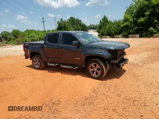 2018 Chevrolet Colorado 4WD Z71 z VIN 1GCGTDEN7J1110282, wystawiony jako Copart lot #61945695 z przebiegiem 144 792 mil mil oraz Szkoda całkowita • Salvage title. Historia ofert i sprzedaży dostępna na DreamBid. Obrazek 13.