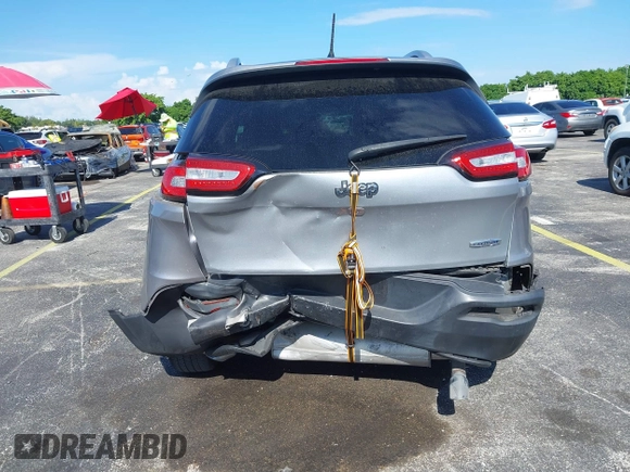 2014 Jeep Cherokee Latitude with VIN 1C4PJLCS6EW103423, listed as a IAAI auction lot 40118289 with 112,120 mi miles and . Bid and sale history available at DreamBid. Image 16.