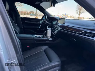 2017 BMW 7 Series 750i с VIN WBA7F0C31HGM21647, выставлен на аукционе Copart как лот 48763345 с пробегом 27 590 миль миль и Чистый • Clean title. История ставок и продаж доступна на DreamBid. Изображение 5.