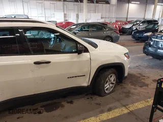 2018 Jeep Compass Sport with VIN 3C4NJCAB6JT124198, listed as a IAAI auction lot 41192196 with 104,557 mi miles. Bid and sale history available at carsss.com. Image 17.