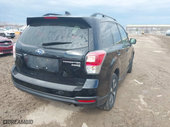 2017 Subaru Forester Premium with VIN JF2SJAGC1HH438553, listed as a IAAI auction lot 41701704 with 125,988 mi miles. Bid and sale history available at carsss.com. Image 4.