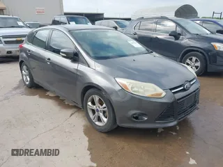 2014 Ford Focus SE with VIN 1FADP3K2XEL323626, listed as a IAAI auction lot 42035049 with 101,551 mi miles. Bid and sale history available at carsss.com. Image 1.