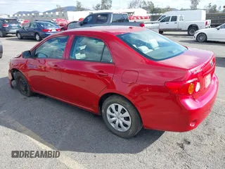 2009 Toyota Corolla with VIN 1NXBU40E89Z128777, listed as a IAAI auction lot 41706079 with 123,184 mi miles. Bid and sale history available at carsss.com. Image 3.