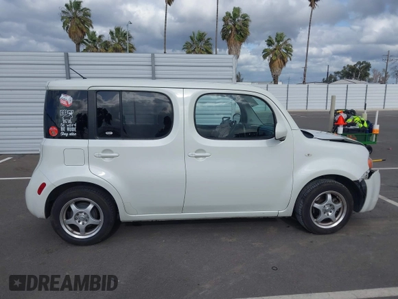 2010 Nissan Cube S z VIN JN8AZ2KRXAT161347, wystawiony jako IAAI lot #41921669 z przebiegiem 161 121 mil mil oraz . Historia ofert i sprzedaży dostępna na DreamBid. Obrazek 13.