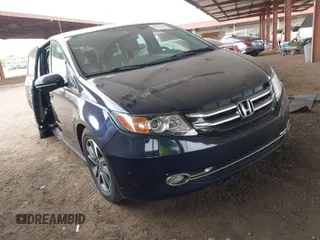 2015 Honda Odyssey Touring Elite with VIN 5FNRL5H93FB013432, listed as a IAAI auction lot 41569460 with 139,522 mi miles and . Bid and sale history available at DreamBid. Image 1.