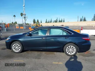 2015 Toyota Camry XLE with VIN 4T4BF1FK4FR512658, listed as a IAAI auction lot 41419793 with 91,741 mi miles. Bid and sale history available at carsss.com. Image 14.