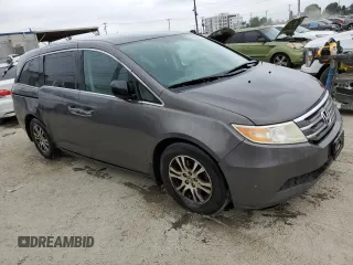 2013 Honda Odyssey EX z VIN 5FNRL5H40DB070687, wystawiony jako Copart lot #58624925 z przebiegiem 232 232 mil mil oraz Czysty tytuł • Clean title. Historia ofert i sprzedaży dostępna na DreamBid. Obrazek 4.