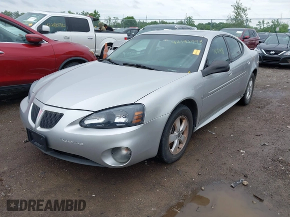 2006 Pontiac Grand Prix z VIN 2G2WP552961183915, wystawiony jako IAAI lot #42193498 z przebiegiem 243 565 mil mil oraz . Historia ofert i sprzedaży dostępna na DreamBid. Obrazek 2.