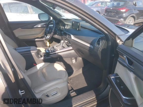 2016 Mazda CX-9 Grand Touring z VIN JM3TCBDY3G0104001, wystawiony jako IAAI lot #41961054 z przebiegiem 77 057 mil mil oraz . Historia ofert i sprzedaży dostępna na DreamBid. Obrazek 5.