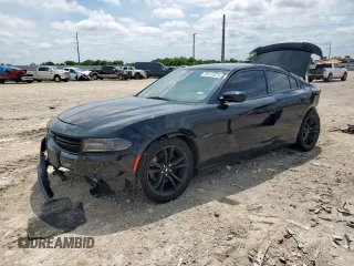 2018 Dodge Charger R/T with VIN 2C3CDXCT8JH164369, listed as a Copart auction lot 59137675 with 133,812 mi miles and Salvage title. Bid and sale history available at DreamBid. Image 1.