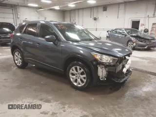 2013 Mazda CX-5 Touring with VIN JM3KE4CE4D0157892, listed as a IAAI auction lot 41684348 with 146,496 mi miles and . Bid and sale history available at DreamBid. Image 1.