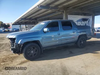 2007 Honda Ridgeline RTL z VIN 2HJYK16517H529643, wystawiony jako Copart lot #58072255 z przebiegiem 70 666 mil mil oraz Szkoda całkowita • Salvage title. Historia ofert i sprzedaży dostępna na DreamBid. Obrazek 1.