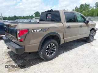 2023 Nissan Titan SV with VIN 1N6AA1ED0PN112536, listed as a IAAI auction lot 42311274 with 45,028 mi miles and . Bid and sale history available at DreamBid. Image 4.