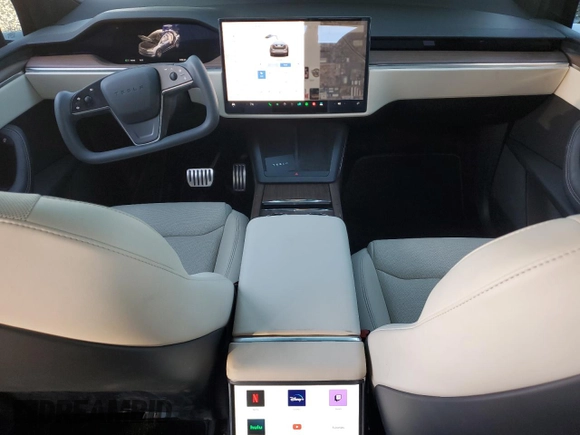 2023 Tesla Model X with VIN 7SAXCAE5XPF384061, listed as a Copart auction lot 86834084 with 6,974 mi miles and Salvage Title. Bid and sale history available at DreamBid. Image 8.