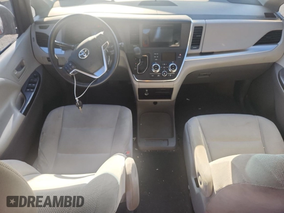 2015 Toyota Sienna L with VIN 5TDZK3DC6FS609767, listed as a Copart auction lot 61188585 with 136,286 mi miles and Salvage title. Bid and sale history available at DreamBid. Image 8.
