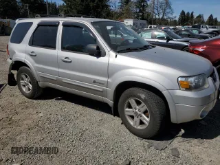 2006 Ford Escape Hybrid with VIN 1FMYU96H06KA69739, listed as a Copart auction lot 53856245 with 121,454 mi miles and Salvage title. Bid and sale history available at DreamBid. Image 4.