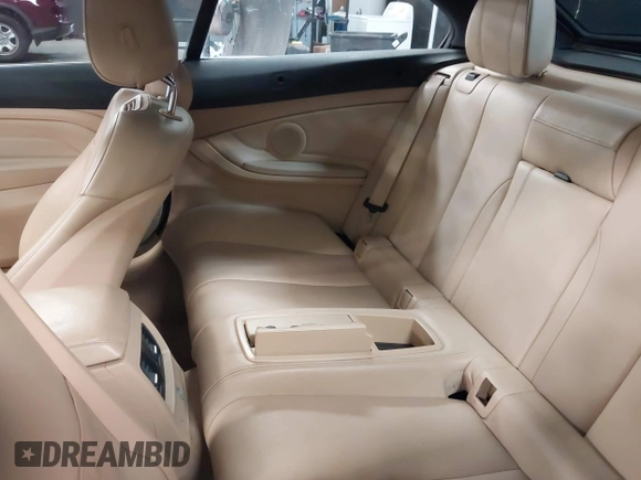 2015 BMW 4 Series 428i xDrive with VIN WBA3T1C52FP821020, listed as a IAAI auction lot 42004707 with 74,951 mi miles and . Bid and sale history available at carsss.com. Image 8.