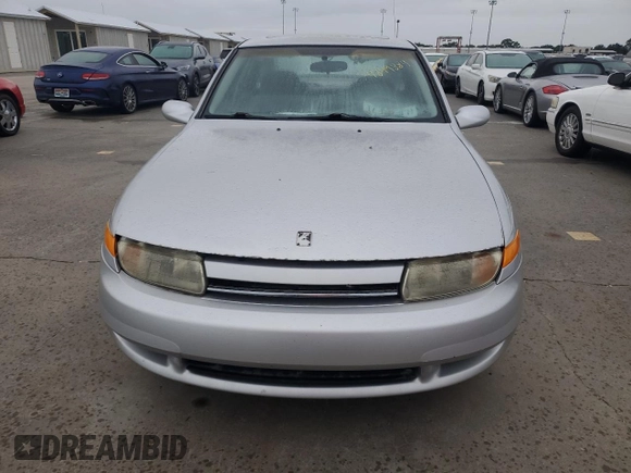 2002 Saturn LS z VIN 1G8JW54R32Y517171, wystawiony jako Copart lot #74849884 z przebiegiem Nie podano mil oraz Szkody całkowita. Historia ofert i sprzedaży dostępna na DreamBid. Obrazek 5.