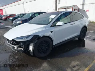 2022 Tesla Model X with VIN 7SAXCDE56NF360208, listed as a IAAI auction lot 41576953 with 9,759 mi miles. Bid and sale history available at carsss.com. Image 22.