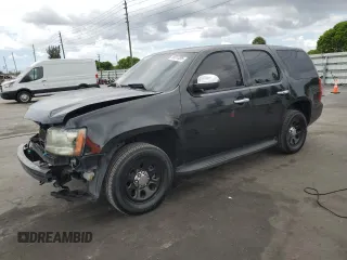 2012 Chevrolet Tahoe Commercial with VIN 1GNLC2E05CR303999, listed as a Copart auction lot 55617295 with 148,326 mi miles and Salvage title. Bid and sale history available at DreamBid. Image 1.