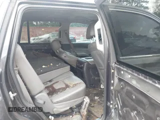 2015 Chevrolet Tahoe LT with VIN 1GNSCBKC4FR183580, listed as a IAAI auction lot 42318000 with Not provided miles and . Bid and sale history available at DreamBid. Image 8.