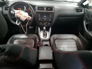 2014 Volkswagen Jetta GLI Edition 30 z VIN 3VW4S7AJ9EM277971, wystawiony jako Copart lot #88305645 z przebiegiem 167 931 mil mil oraz Szkoda całkowita • Salvage title. Historia ofert i sprzedaży dostępna na DreamBid. Obrazek 8.