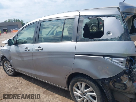 2014 Mazda 5 Sport with VIN JM1CW2BL6E0164195, listed as a IAAI auction lot 42455158 with 155,007 mi miles and . Bid and sale history available at DreamBid. Image 15.