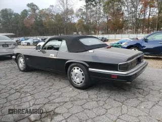 1996 Jaguar XJS with VIN SAJNX2740TC225643, listed as a Copart auction lot 80975784 with 98,427 mi miles and Salvage Title. Bid and sale history available at carsss.com. Image 2.