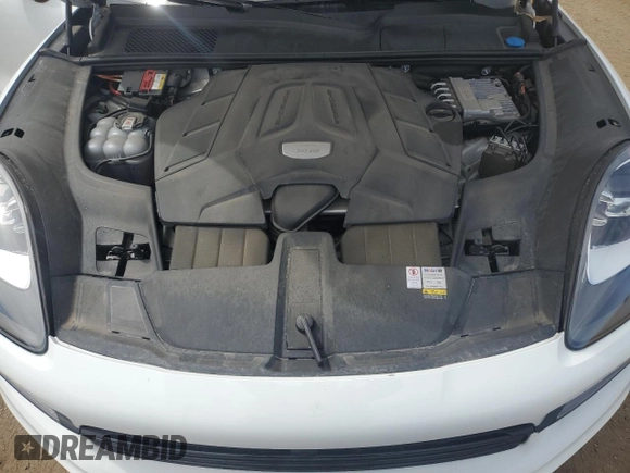 2022 Porsche Cayenne z VIN WP1AA2AY2NDA04695, wystawiony jako Copart lot #52499635 z przebiegiem 25 087 mil mil oraz Szkoda całkowita • Salvage title. Historia ofert i sprzedaży dostępna na DreamBid. Obrazek 12.