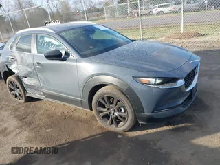 2023 Mazda CX-30 S Carbon Edition with VIN 3MVDMBCM1PM573317, listed as a IAAI auction lot 41785371 with 6,475 mi miles and . Bid and sale history available at DreamBid. Image 1.