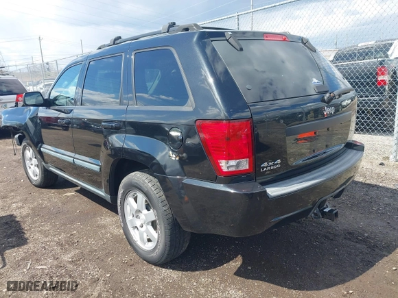 2009 Jeep Grand Cherokee Laredo with VIN 1J8GR48K99C550822, listed as a IAAI auction lot 41868508 with 179,436 mi miles. Bid and sale history available at carsss.com. Image 3.