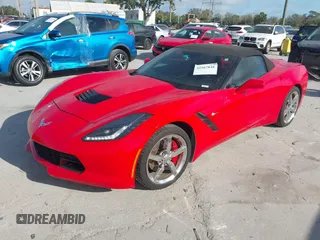 2015 Chevrolet Corvette 1LT with VIN 1G1YB3D7XF5124917, listed as a IAAI auction lot 41567848 with 104,886 mi miles. Bid and sale history available at carsss.com. Image 2.