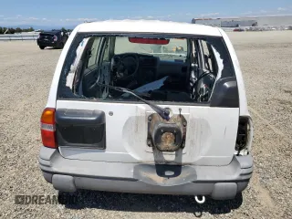 2003 Chevrolet Tracker ZR2 z VIN 2CNBJ734236932592, wystawiony jako Copart lot #58171145 z przebiegiem Nie podano mil oraz Szkoda całkowita • Salvage title. Historia ofert i sprzedaży dostępna na DreamBid. Obrazek 6.
