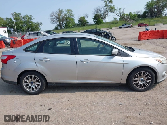 2012 Ford Focus SE with VIN 1FAHP3F22CL115653, listed as a IAAI auction lot 42380304 with 192,639 mi miles and . Bid and sale history available at DreamBid. Image 13.