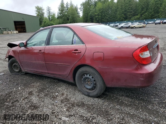 2004 Toyota Camry LE z VIN JTDBE32KX40273821, wystawiony jako Copart lot #58938275 z przebiegiem 153 096 mil mil oraz Szkoda całkowita • Salvage title. Historia ofert i sprzedaży dostępna na DreamBid. Obrazek 2.