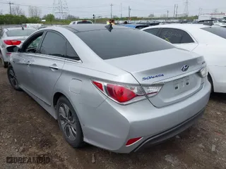 2014 Hyundai Sonata Hybrid Limited with VIN KMHEC4A47EA115911, listed as a IAAI auction lot 42038305 with 232,793 mi miles. Bid and sale history available at carsss.com. Image 3.