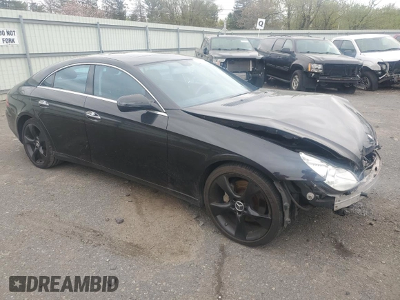 2009 Mercedes-Benz CLS-Class 5.5L with VIN WDDDJ72X99A142572, listed as a Copart auction lot 52297195 with 87,520 mi miles and Salvage Title. Bid and sale history available at carsss.com. Image 4.