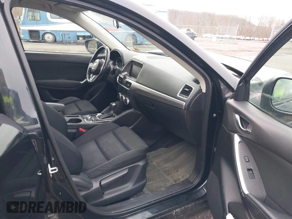 2016 Mazda CX-5 Touring with VIN JM3KE4CY4G0738713, listed as a IAAI auction lot 41998597 with 146,595 mi miles and . Bid and sale history available at carsss.com. Image 5.