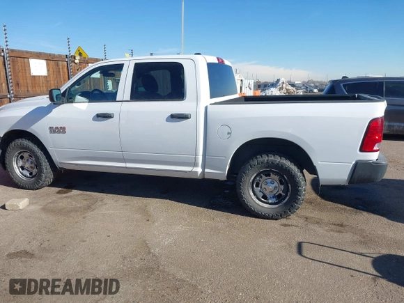 2015 Ram 1500 Tradesman with VIN 1C6RR7KG5FS660748, listed as a IAAI auction lot 41403779 with 201,127 mi miles and . Bid and sale history available at DreamBid. Image 14.