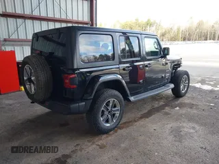 2019 Jeep Wrangler Unlimited Sahara with VIN 1C4HJXEG5KW532861, listed as a IAAI auction lot 41698912 with 121,278 mi miles and . Bid and sale history available at DreamBid. Image 4.