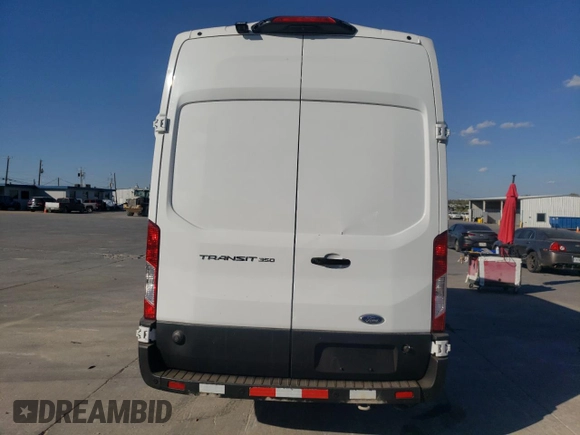 2020 Ford Transit Cargo with VIN 1FTBW3X89LKB13278, listed as a Copart auction lot 77077524 with 28,382 mi miles and Salvage Title. Bid and sale history available at DreamBid. Image 6.