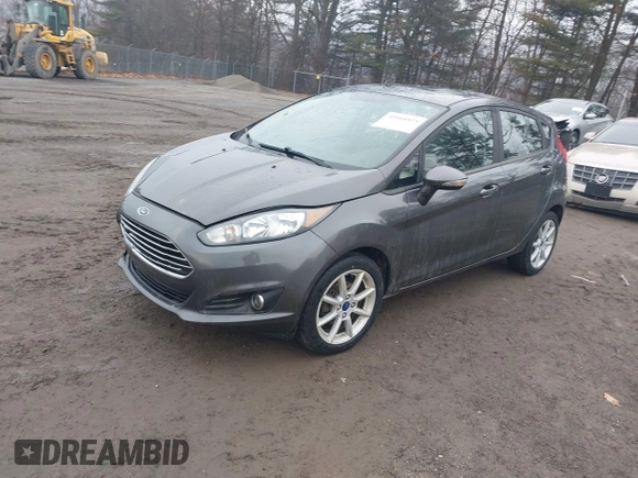2018 Ford Fiesta SE with VIN 3FADP4EJ9JM126299, listed as a IAAI auction lot 41660973 with 74,730 mi miles. Bid and sale history available at carsss.com. Image 2.