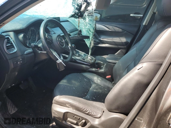 2021 Mazda CX-9 Touring z VIN JM3TCACY5M0500924, wystawiony jako Copart lot #50654505 z przebiegiem 57 067 mil mil oraz Szkoda całkowita • Salvage title. Historia ofert i sprzedaży dostępna na DreamBid. Obrazek 7.
