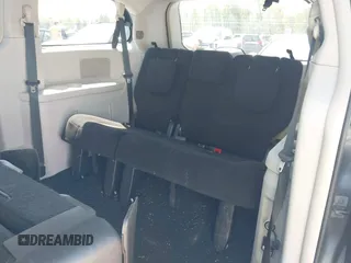 2013 Dodge Grand Caravan Crew with VIN 2C4RDGDG1DR800538, listed as a IAAI auction lot 42211140 with 138,647 mi miles and . Bid and sale history available at DreamBid. Image 13.